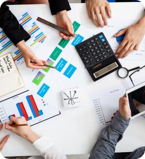 Team working on graphs and charts